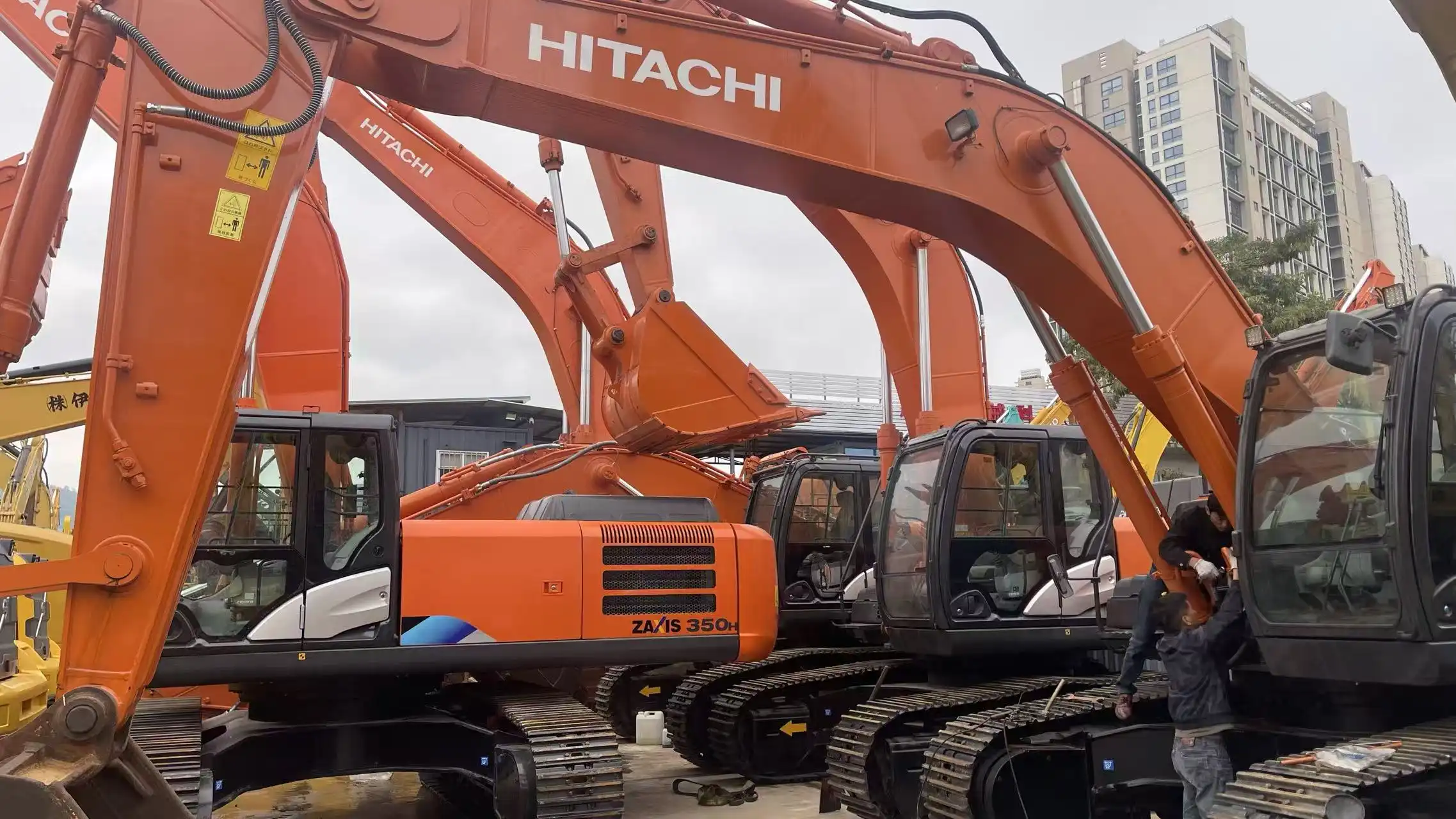 Professional Maintenance, Ensuring Equipment Condition - Hitachi 350-5A Undergoing Servicing